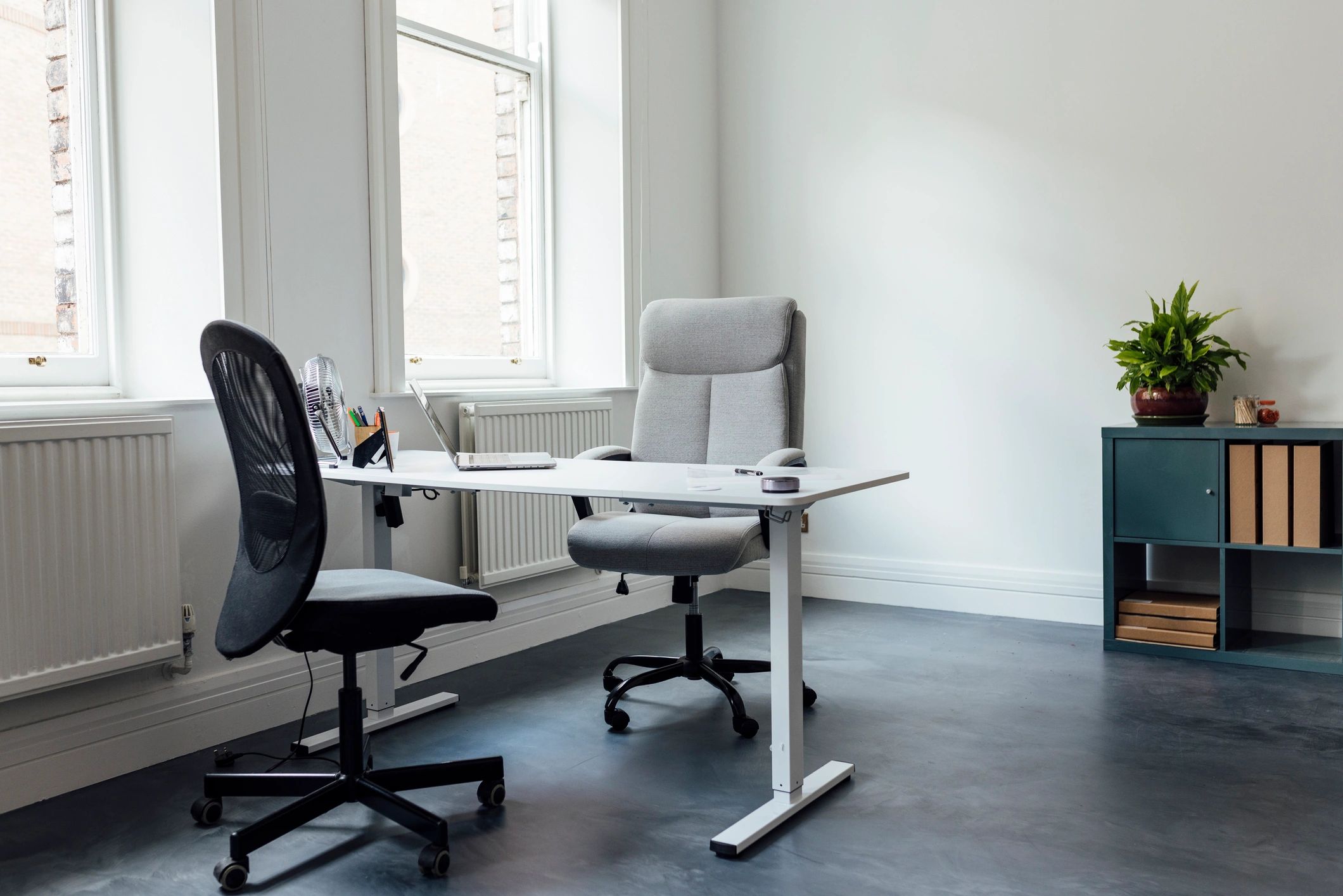 Modern workspace with desk and office equipment
