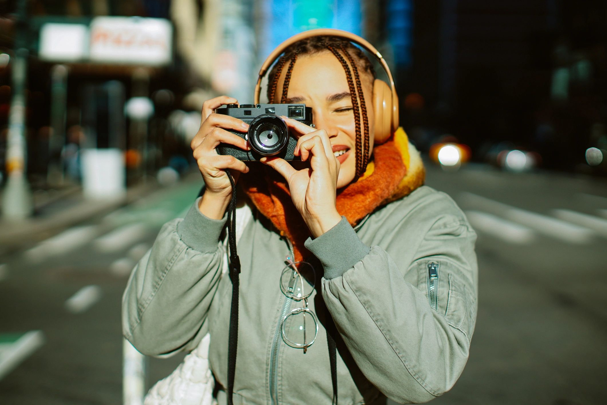 Photographer using a film camera outdoors